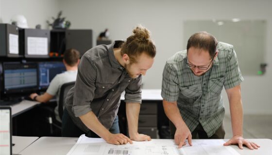 Engineers review drawings