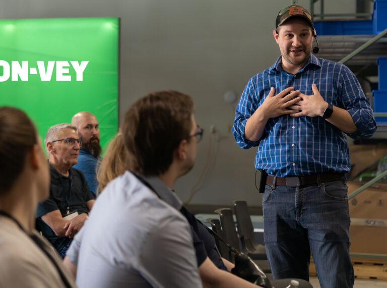 A Con-Vey employee presents to members of the Roseburg community